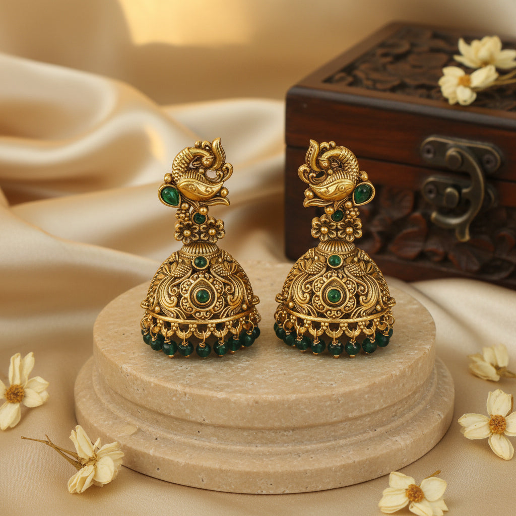 Lakshana Traditional Antique Gold Peacock Jhumka Earrings with Emerald Green Stones